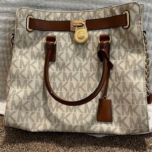 Michael Kors tote, cream and brown leather,gold hardware, lightly used.
